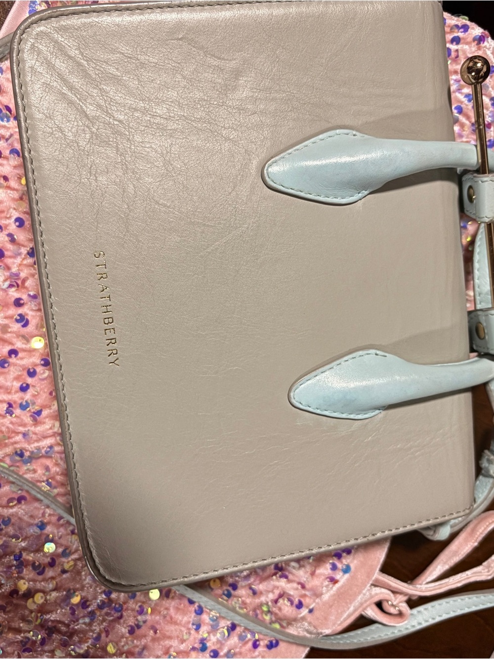 Strathberry pale pink leather satchel with light blue handles